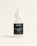 Hyaluronic acid serum bottle with dropper on neutral background, showing clear gel formula for daily facial hydration